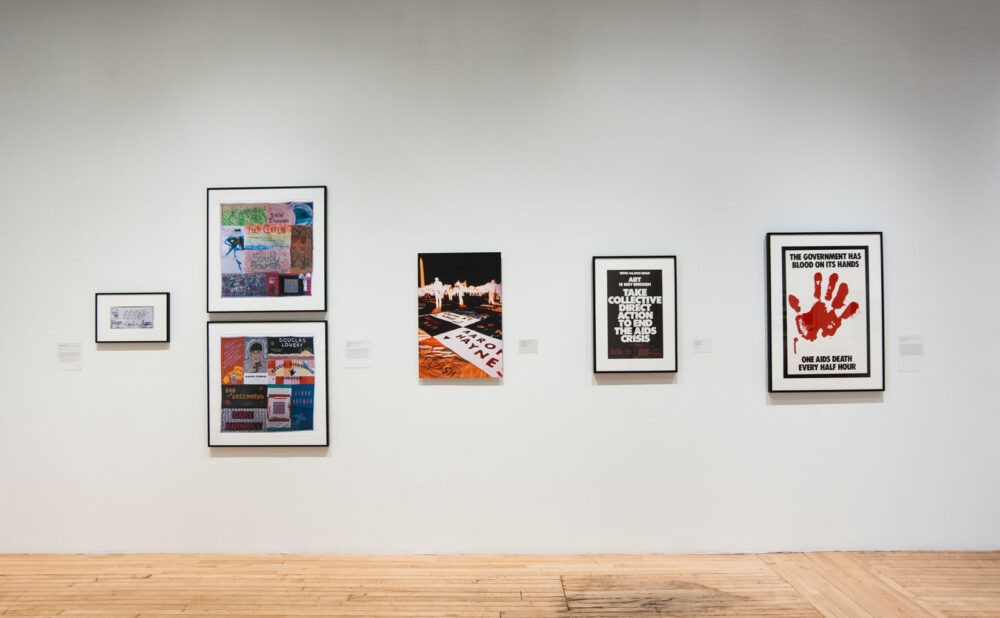 White gallery wall displaying five small, neatly spaced framed prints and artwork. (Alt-text generated by AI)