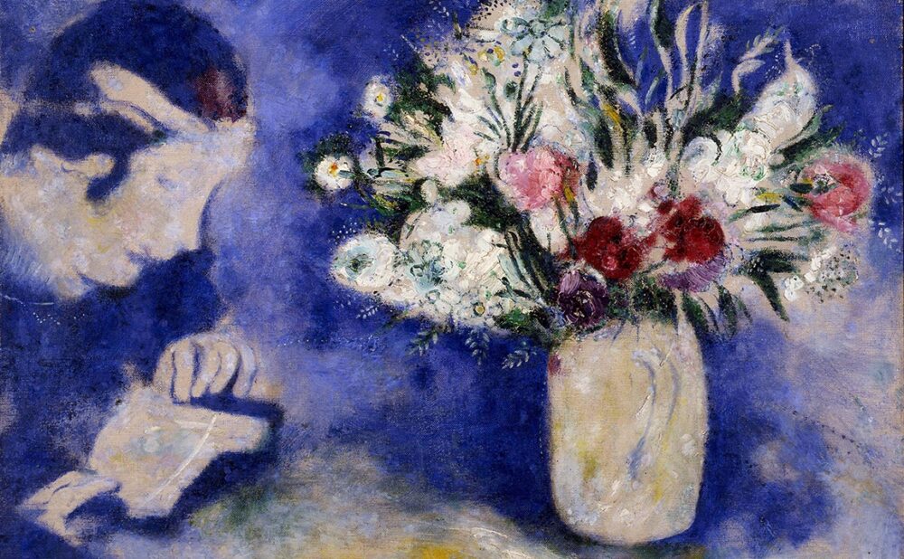 A painting of a person reading beside a vase of colorful flowers against a blue background.
