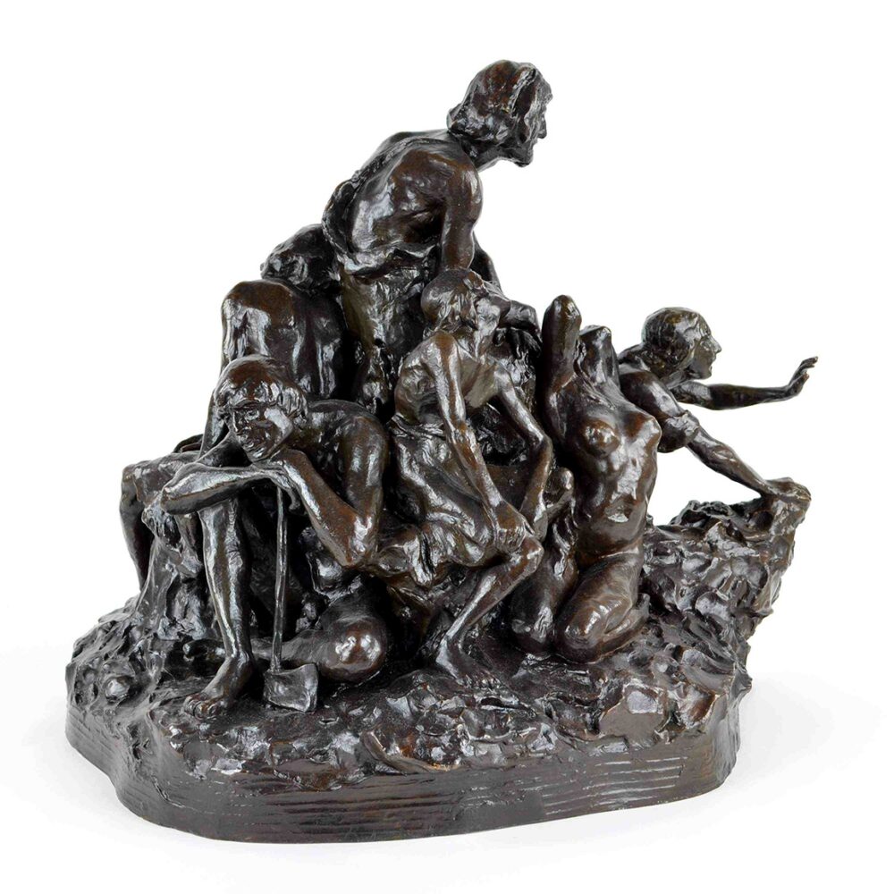Bronze sculpture of six human figures in dynamic poses on a rock-like base.