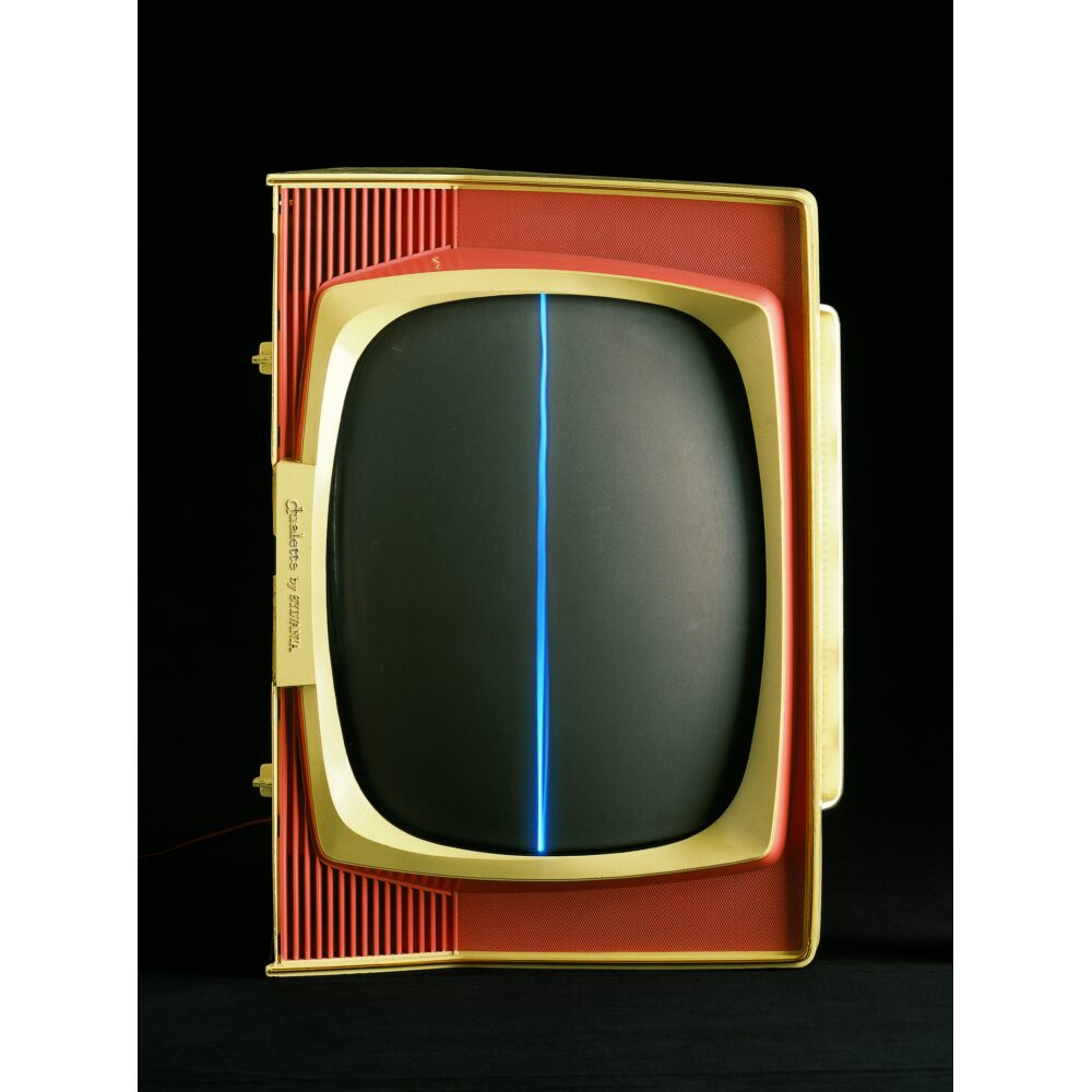 A small retro television set with a single bright vertical blue line running down the screen. Alt text generated by AI.
