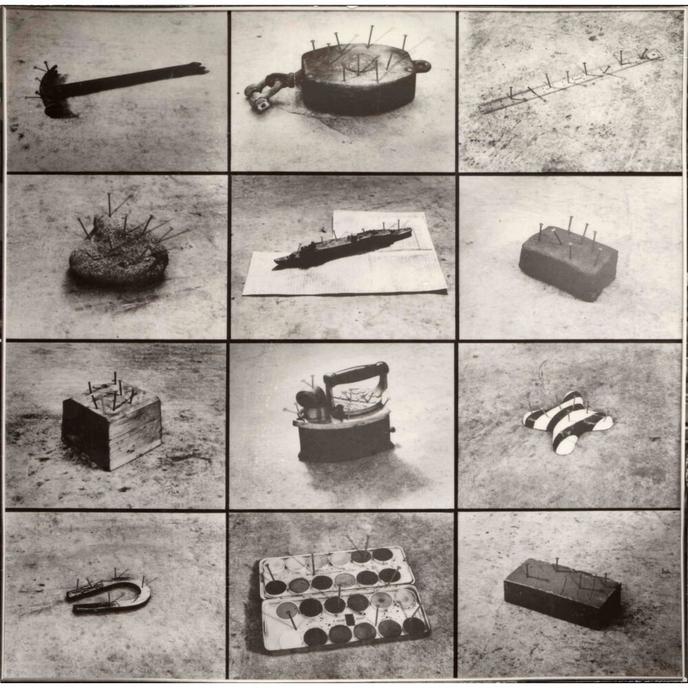 Twelve-panel grid photograph by Kanji Wakae showing isolated everyday objects penetrated with arrays of bent nails. (Alt-text generated by AI)