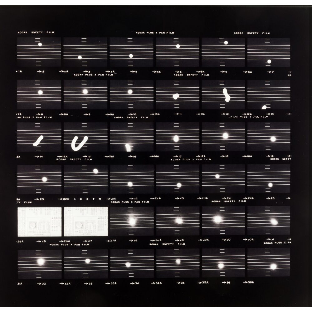Grid arrangement of small black-and-white photographs recording phases of light and moon positions by Hitoshi Nomura. (Alt-text generated by AI)