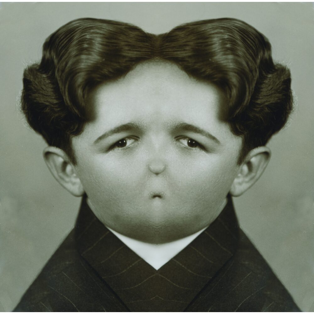 Black-and-white surreal portrait of a person with symmetrical dark hair, pouting lips, and altered facial proportions. (Alt-text generated by AI)