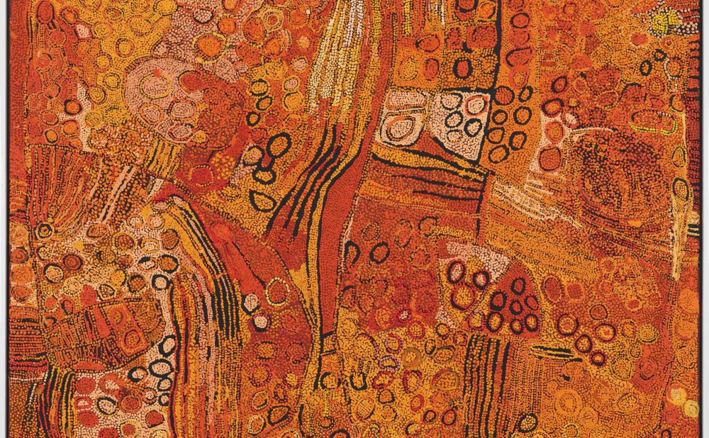 Abstract Aboriginal painting with circular patterns and vibrant orange, red, and yellow colors.