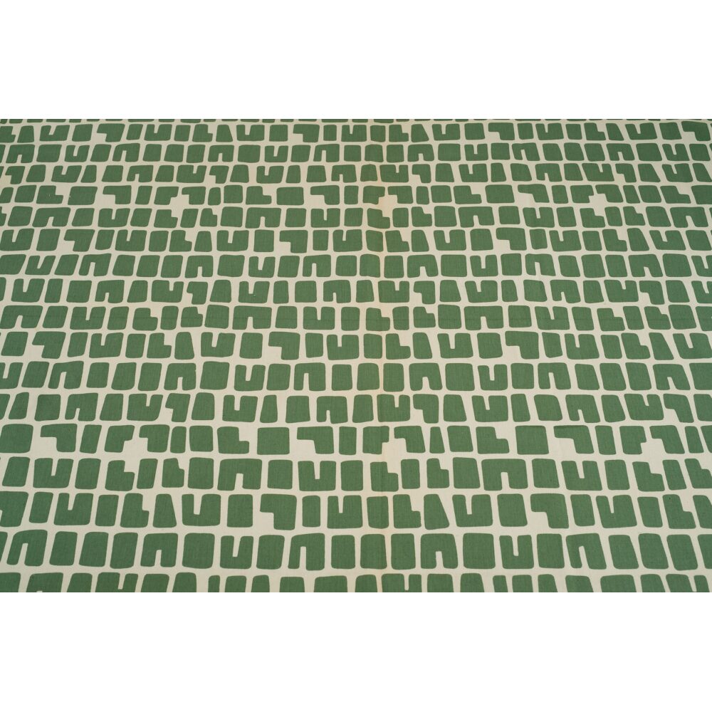 Angelo Testa woven textile pattern featuring a repeating geometric grid design in shades of green and white. (Alt-text generated by AI)
