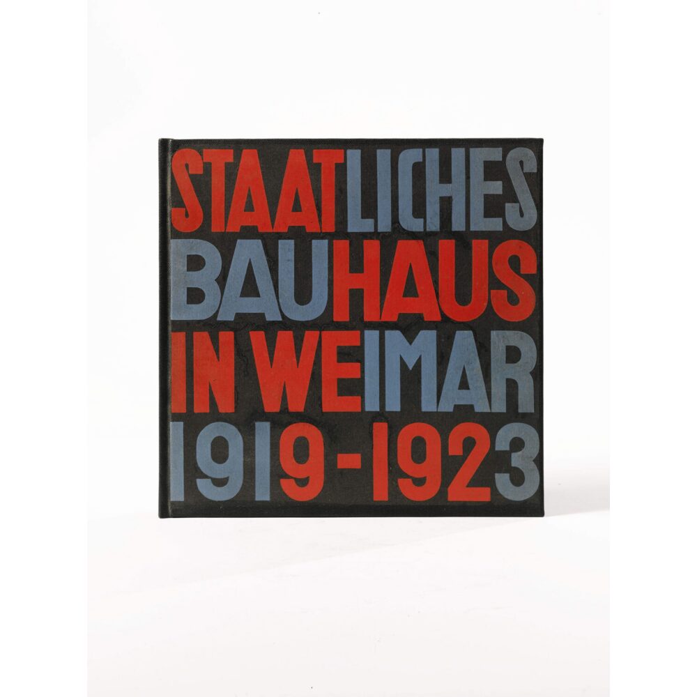 Cover of the 1923 Bauhaus catalogue designed by Herbert Bayer and László Moholy-Nagy featuring bold typographic layout. (Alt-text generated by AI)