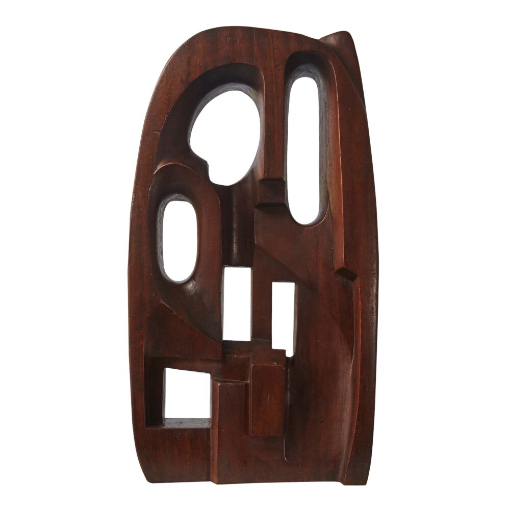 Abstract wooden sculpture with cut-out shapes and a polished finish. Alt-text generated by AI.