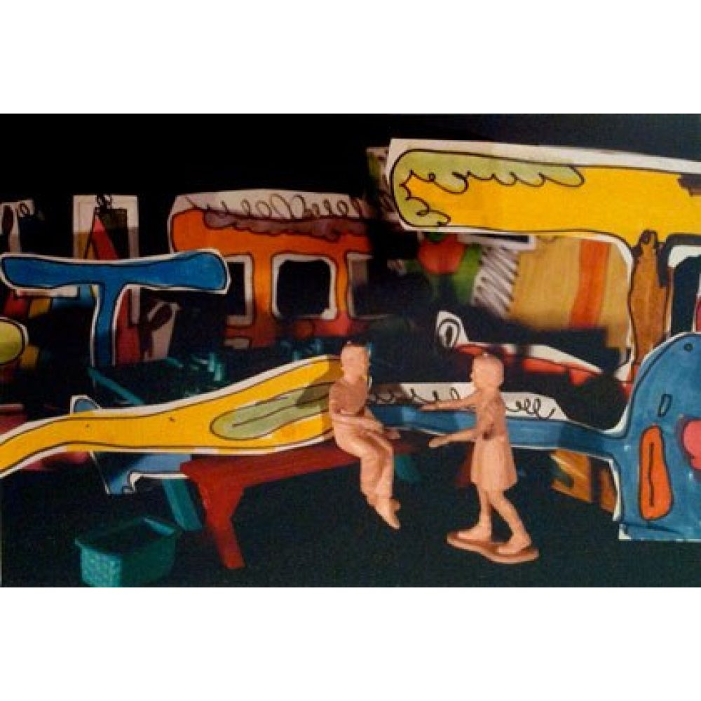 Two small nude figurines on an abstract colorful backdrop resembling buildings and a street. Alt-text generated by AI.