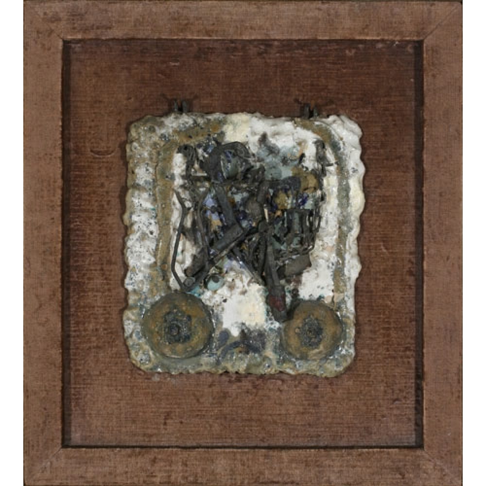 Abstract artwork with textured metal-like materials, including something resembling a necklace, in a wooden frame.