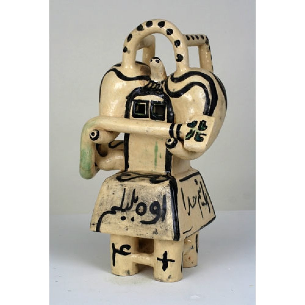 Cream-colored abstract ceramic sculpture with black and green details and Persian calligraphic text.