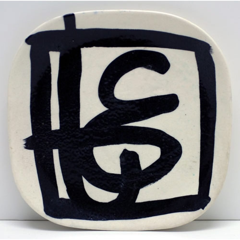 Square ceramic plate with abstract black design on white background.
