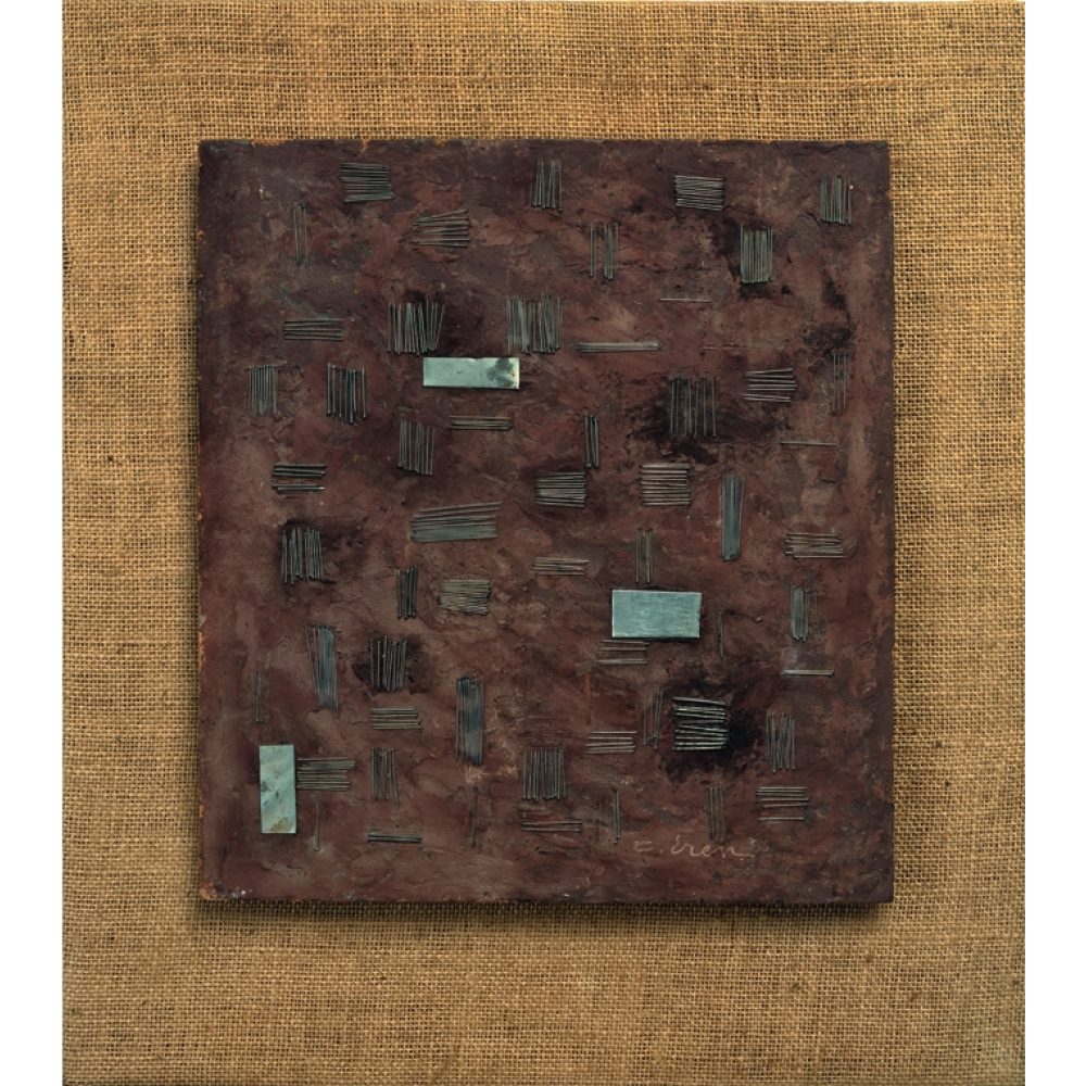 An abstract artwork with metallic elements on a textured brown background mounted on burlap. Alt-text generated by AI.