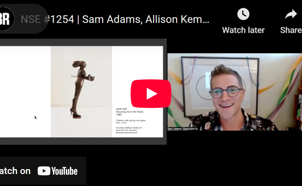 A YouTube thumbnail showing a Zoom recording featuring a sculpture titled "Shooting from the Heart" and a smiling person with short hair and glasses.