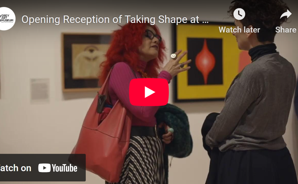 YouTube video titled "Opening Reception of Taking Shape at . . ." showing two people converse in an art gallery with abstract paintings in the background.