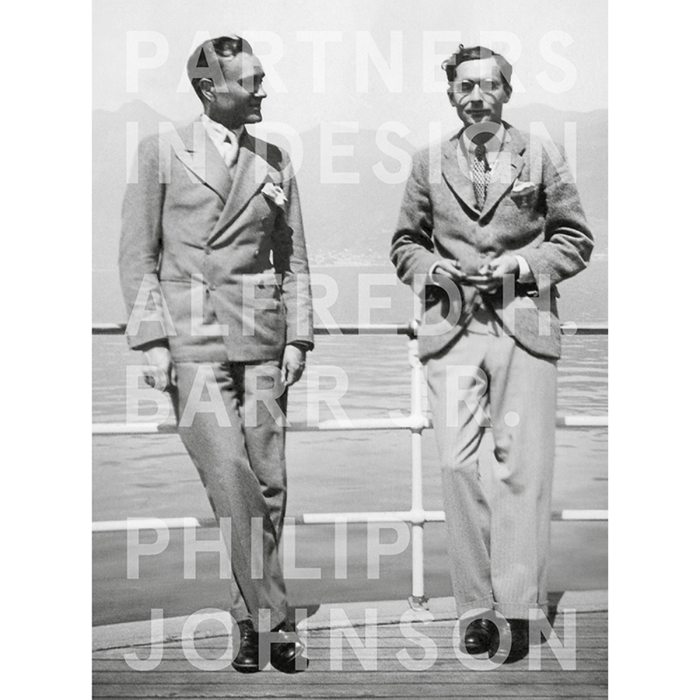Book cover for "PARTNERS IN DESIGN: ALFRED H. BARR JR. AND PHILIP JOHNSON"showing black-and-white photograph of two well-dressed men standing outdoors on a boat deck or waterfront pier in front of a railing overlooking water and distant hills. (Alt-text generated by AI.)