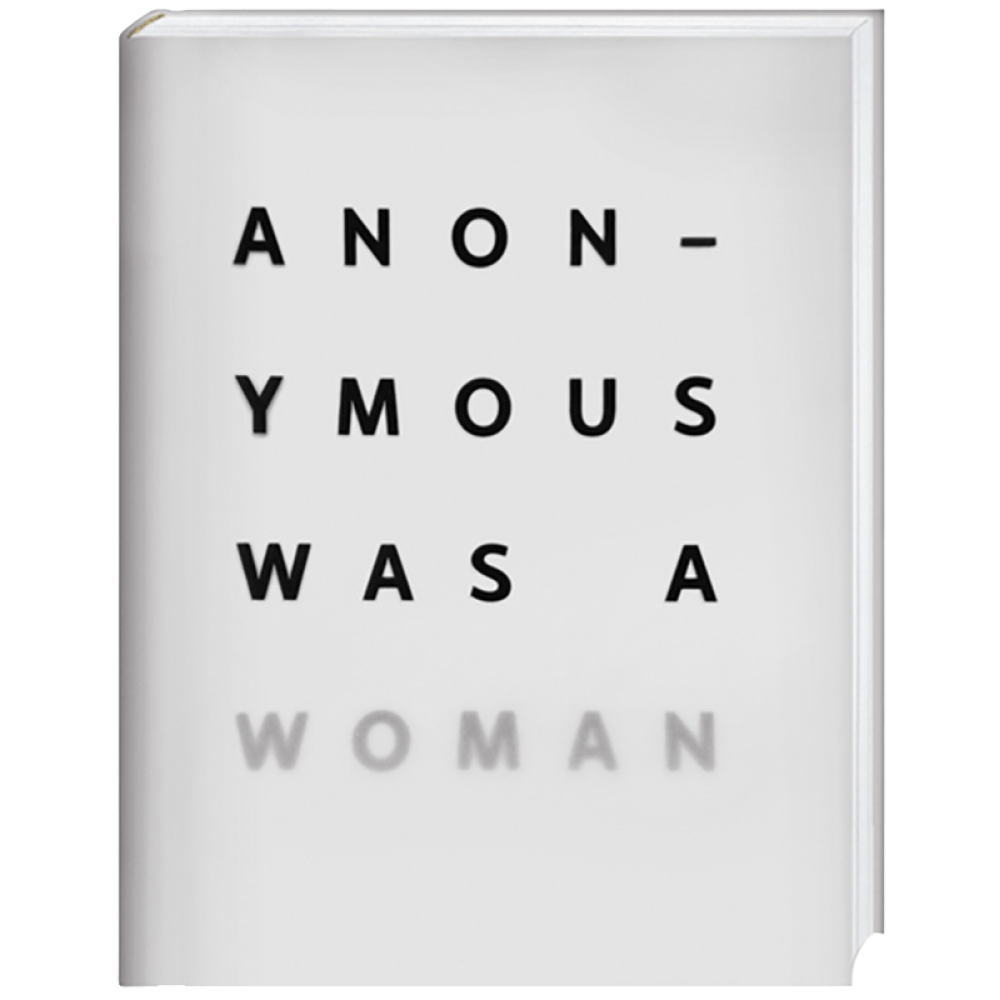 Cover of a book titled Anonymous WAs A Woman: The First 25 Years ; its front cover bears the title, the word "woman" blurred by the transparent dust jacket.
