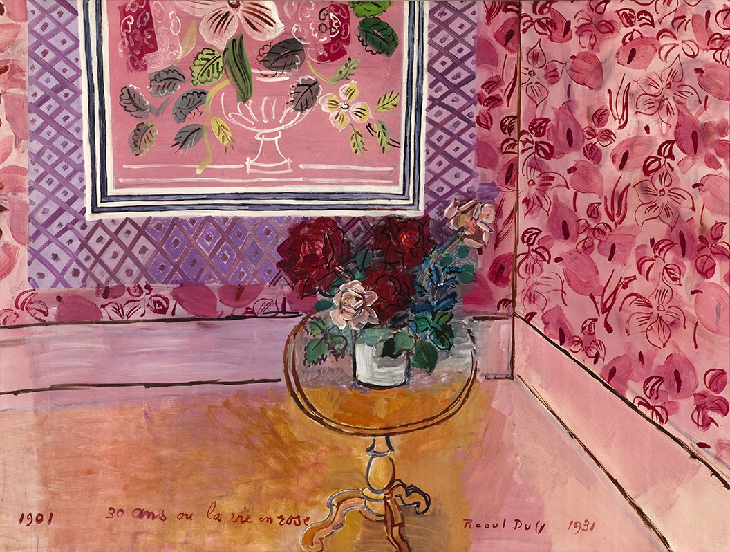 A colorful painting of a floral and geometric patterned room with a bouquet of roses on a round table, with French text painted at the bottom of the composition that reads: 1901 30 ans ou la vie en rose Raoul Dufy 1931.